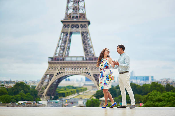 istock Romantic loving couple having a date near the Eiffel tower 598797952