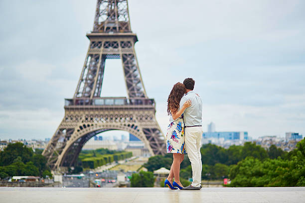 istock Romantic loving couple having a date near the Eiffel tower 598798042