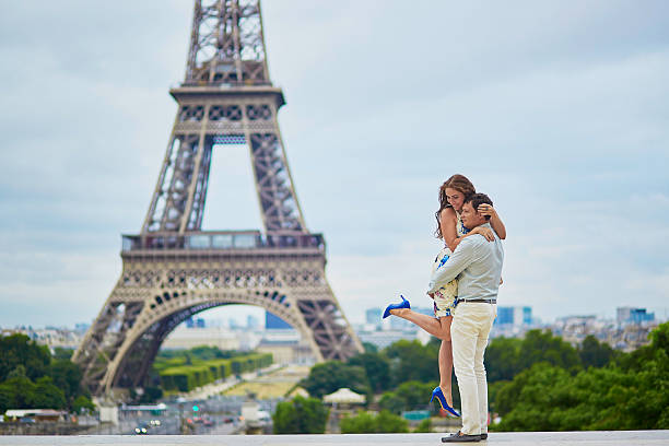 istock Romantic loving couple having a date near the Eiffel tower 598798606