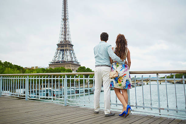 istock Romantic loving couple having a date near the Eiffel tower 598799118