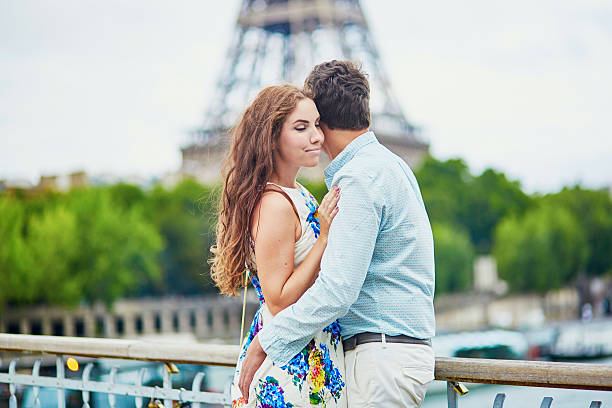 istock Romantic loving couple having a date near the Eiffel tower 598799438