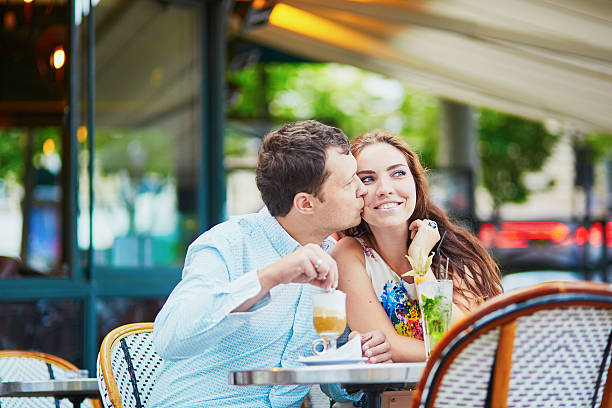 Romantic loving couple in Parisian cafe