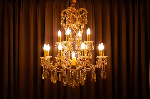 istock shining chandelier and curtain 598800930