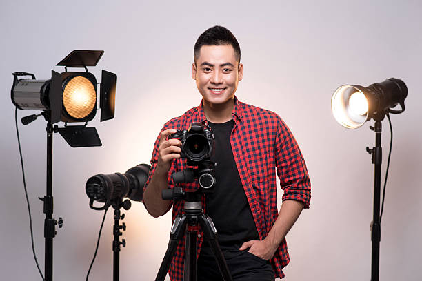Photographer with camera and tripod