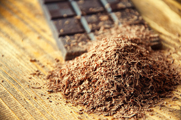 istock Cubes of chocolate and grated chocolate 598808550