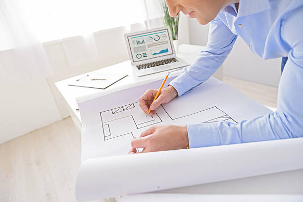istock Adult businessman working in office 598810198