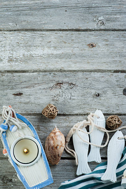 istock Marine items on old wooden background 598810614