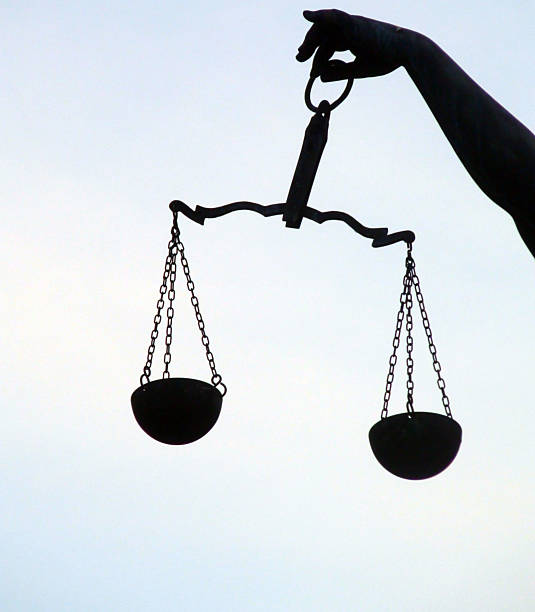 istock View Of Sky,Hand Holding Justice Weight Scale 598810746