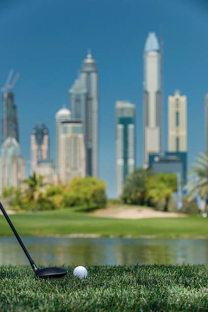 istock Club hits ball.  Golf ball lying on the grass 598814388