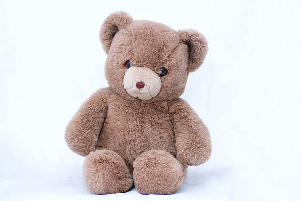 istock stuffed toy bear standing on a white background . 598815240