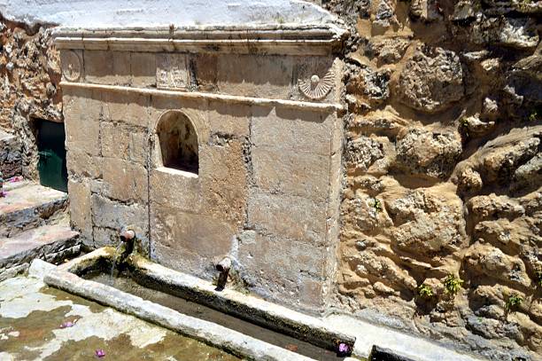 istock Old stone fountain in the campaign 598816008
