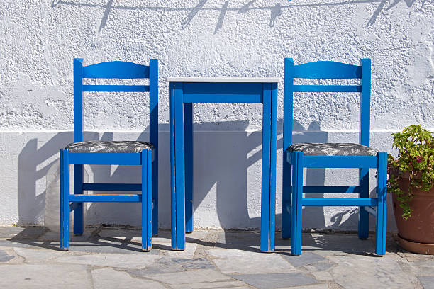 Traditional furniture in Greece at an outdoor restaurant.