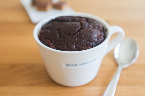 Close up of baked chocolate cake in cup