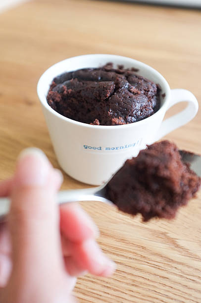 istock Woman eating mug cake 598818364