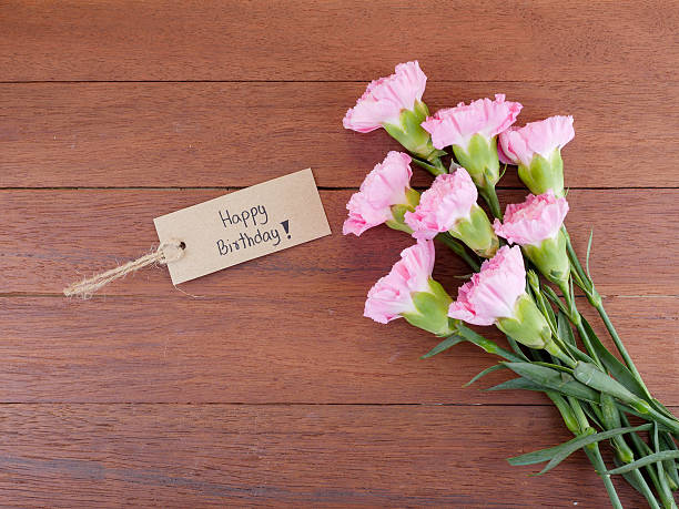 istock Handwriting Happy Birthday and Carnation flower 3 598820066