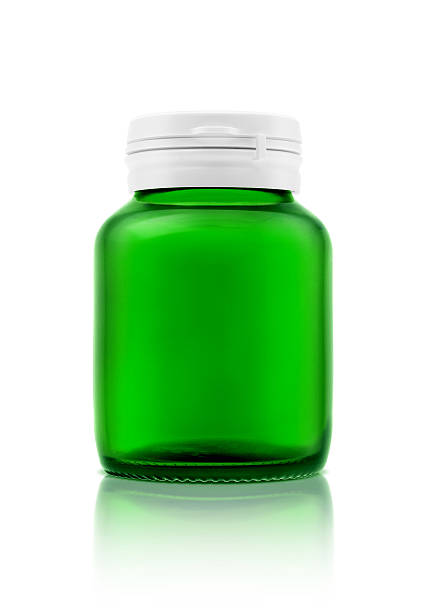 istock Blank green glass supplement bottle isolated on white background 598820946