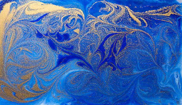 istock Blue and golden liquid texture, watercolor hand drawn marbling illustration 598821316