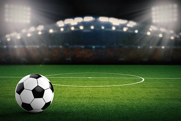 istock soccer ball with stadium 598824196