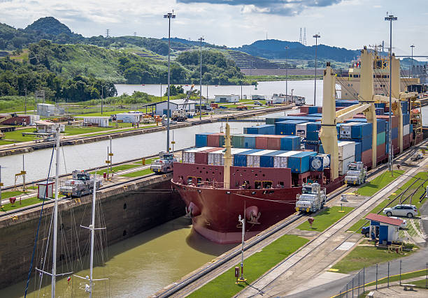 istock Ship crossing Panama Canal being lowered at Miraflores Locks 598824310