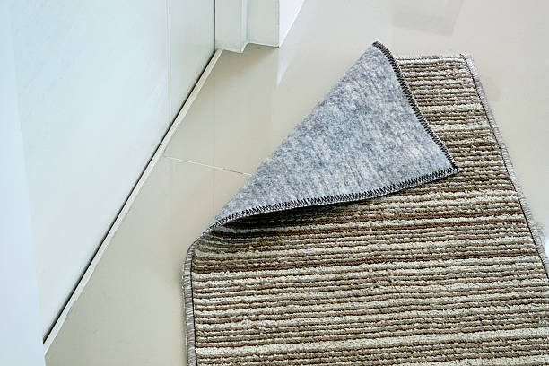 istock doormat in front of toilet 598825320