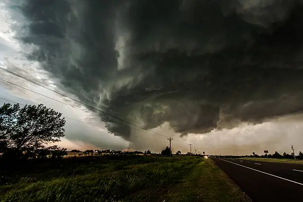 This photo captures the tightening hail core of this monstrous supercell storm. This photo was taken just before the storm passed over the town of Piedmont in Oklahoma where several other chasers reported a tornado touching down near a gas station.