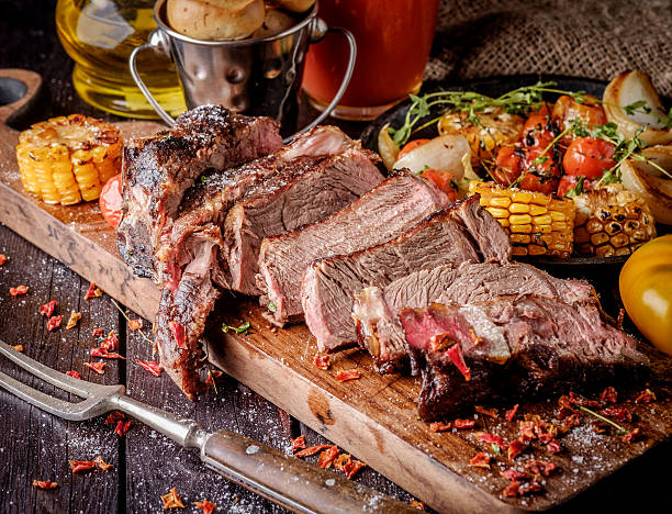 istock Grilled steak sliced on a cutting board. 598828796