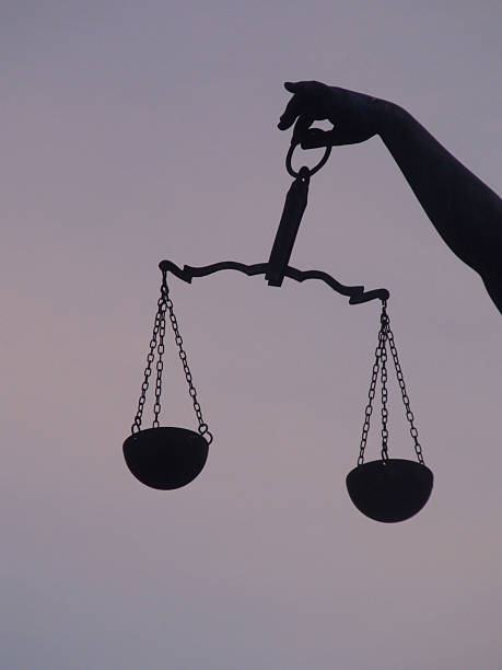 istock Lady Justice Holding Weight Scale Close Up 598829846
