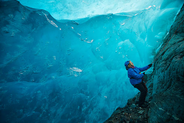 istock wonderlust in a blue ice cave 598830826