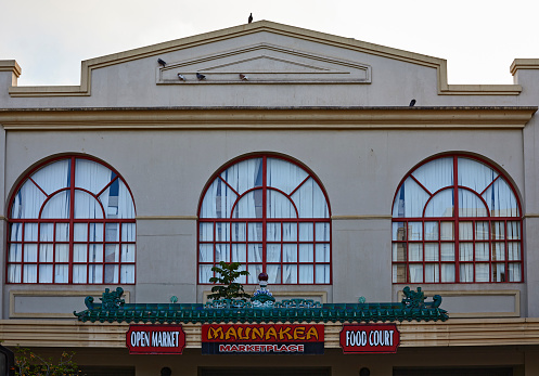 Honolulu, Hawaii, USA - August 6, 2016: Maunakea Marketplace in the Chinatown Historic District is a popular local destination and tourist attraction in Hawaii and dates back to the early 1900s.