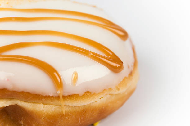 istock Close-up Vanilla Caramel Donut Isolated 598916026