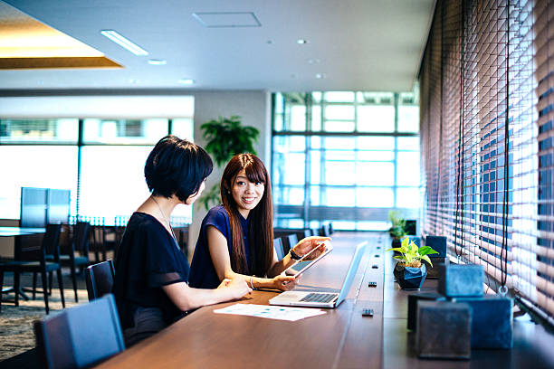 istock Finance minister assistants in Japan analyzing financial situation 598916366