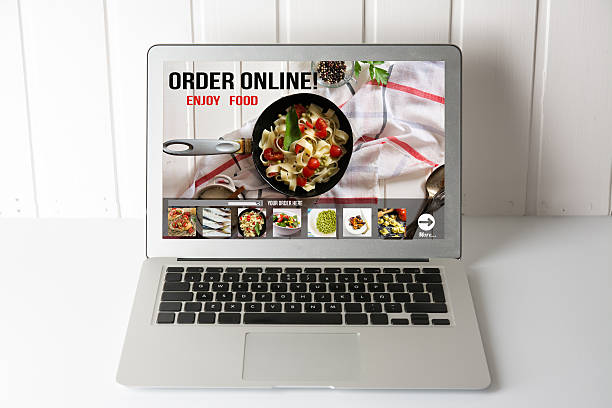 istock Computer with Online food delivery app on screen. lifestyle conc 598919006
