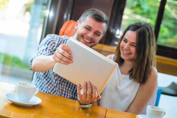 istock Couple taking a photo 598919742