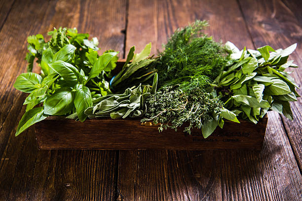 istock Fresh herbs in wooden rustic box 598924598