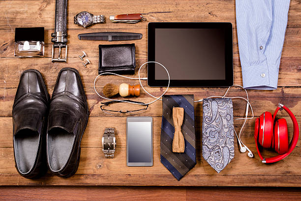 istock Men's accessories organized on table.  No people.  Knolling. 598928310
