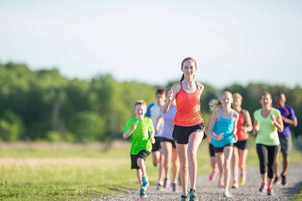 istock Families Jogging on a Sunny Day 598929200