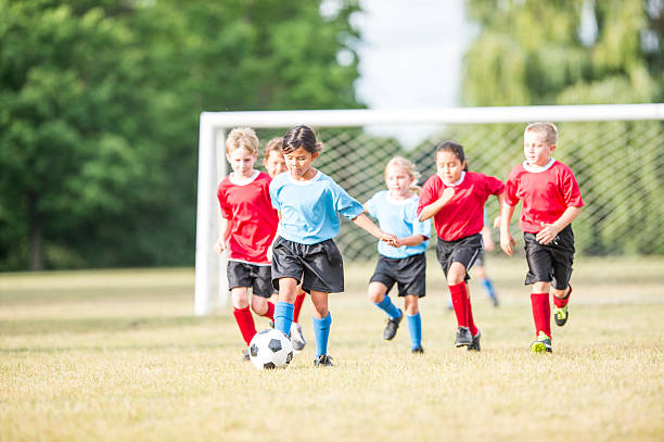 istock Playing a Soccer Game on a Summer Day 598934544