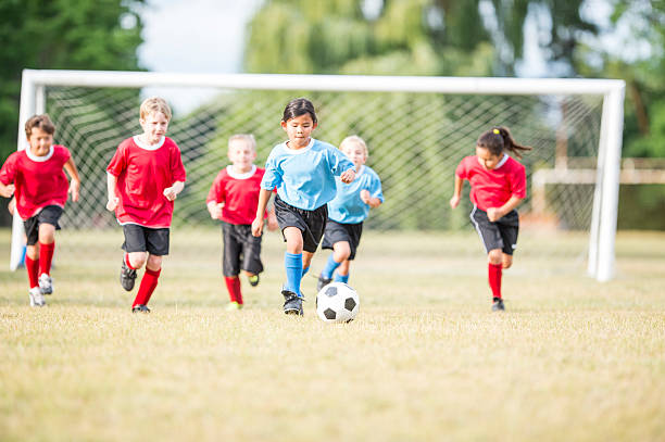 istock Kicking the Ball Down the Field 598934554