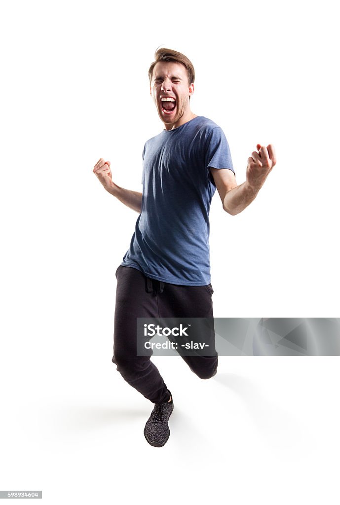 yeah man yeah! handsome young man, isolated on white background with clipping path included Exhilaration Stock Photo