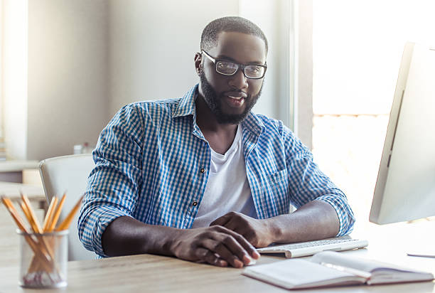 istock Afro American businessman at home 598935184