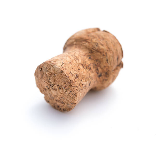istock wooden cork from champagne bottle on a white backrgound 598948662