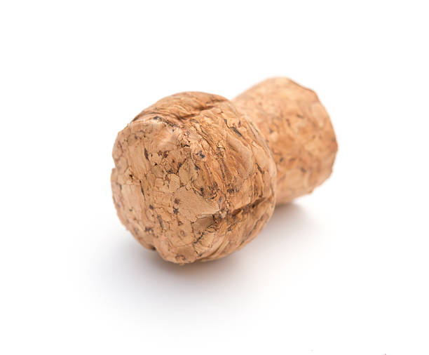 istock wooden cork from champagne bottle on a white backrgound 598948686