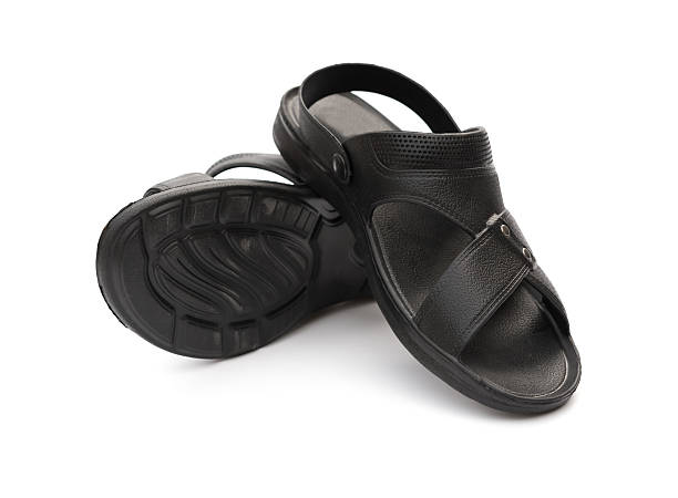 istock pair of black leisure sandal on white background 598950086