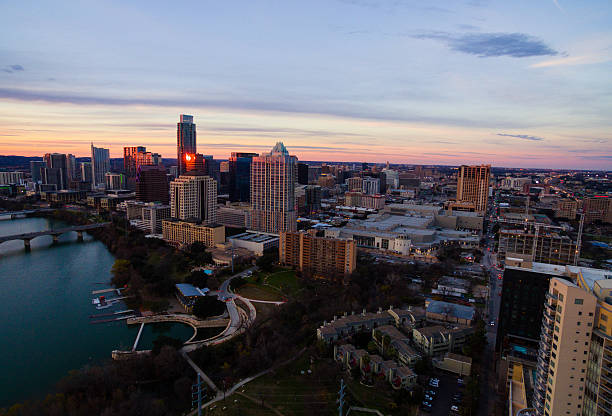 istock Aerial: Colorful Tranquil Sunset over Austin Texas Cityscape Skyline 598950630