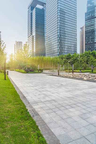 istock green park front of office builsings 598950784