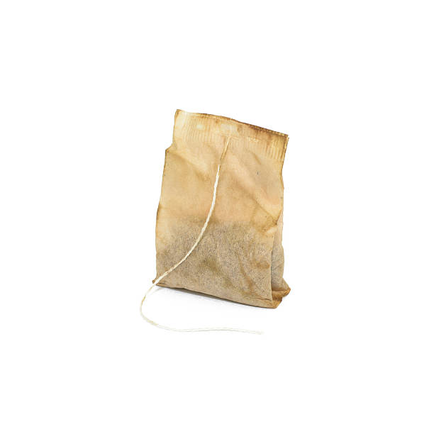 istock Used Tea bag isolated on white background 598954150