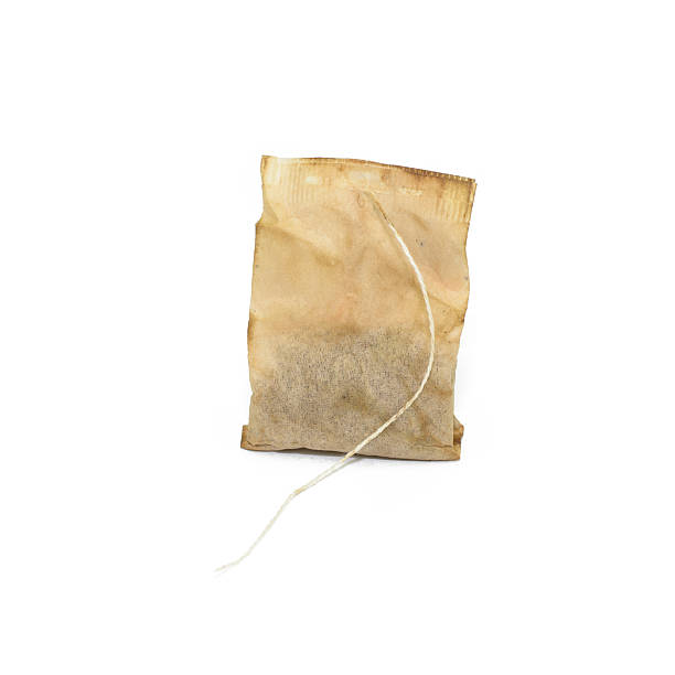 istock Used Tea bag isolated on white background 598954168
