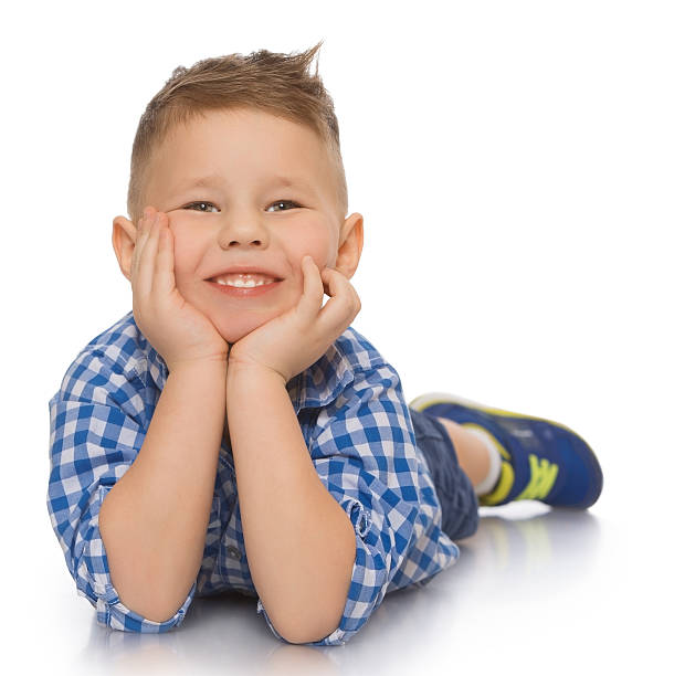 istock The boy lies on the floor 598956182