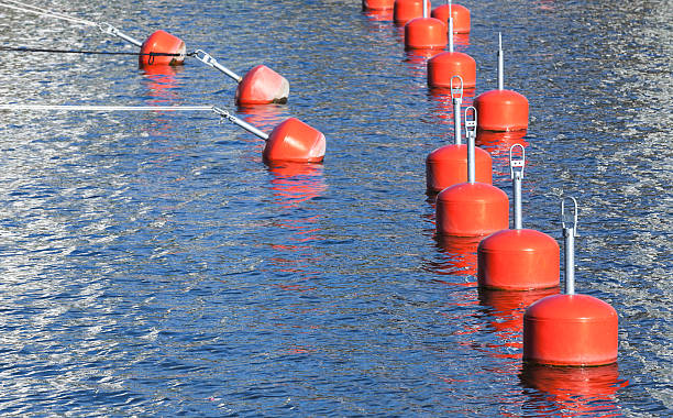 istock Small red mooring buoys in a row 598956712