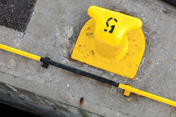 istock Yellow port mooring bollard with number 5 label 598957146